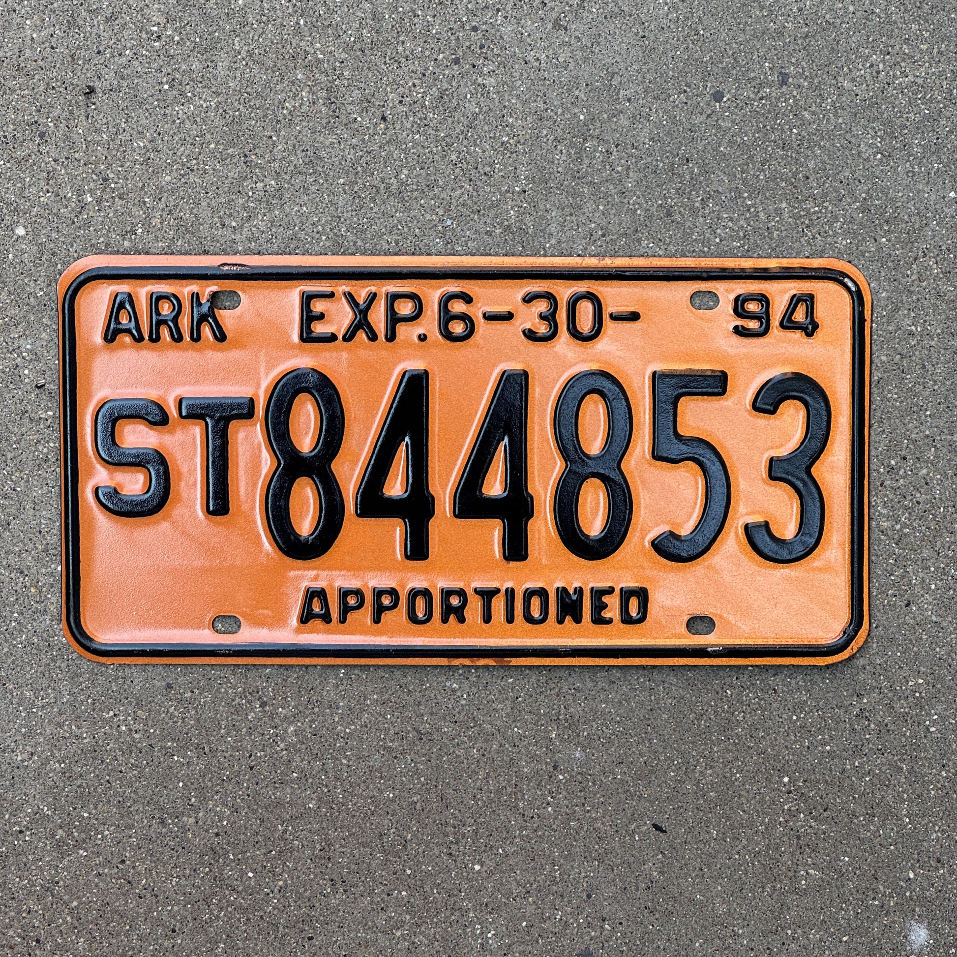 Photo of a 1994 Arkansas Apportioned License Plate Auto Tag Garage Decor Vintage Semi Trailer ST 844853 with original patina