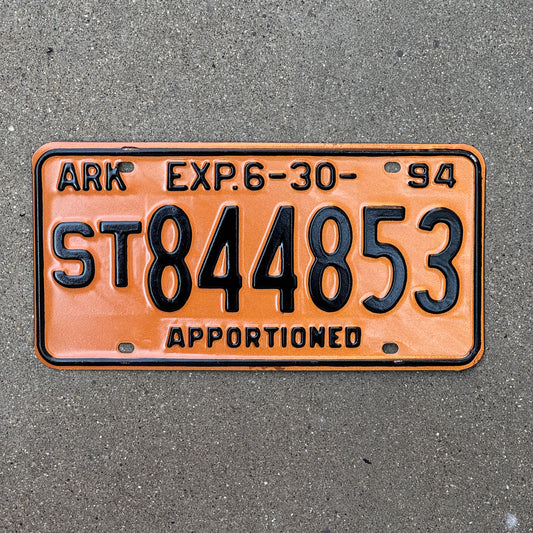 Photo of a 1994 Arkansas Apportioned License Plate Auto Tag Garage Decor Vintage Semi Trailer ST 844853 with original patina