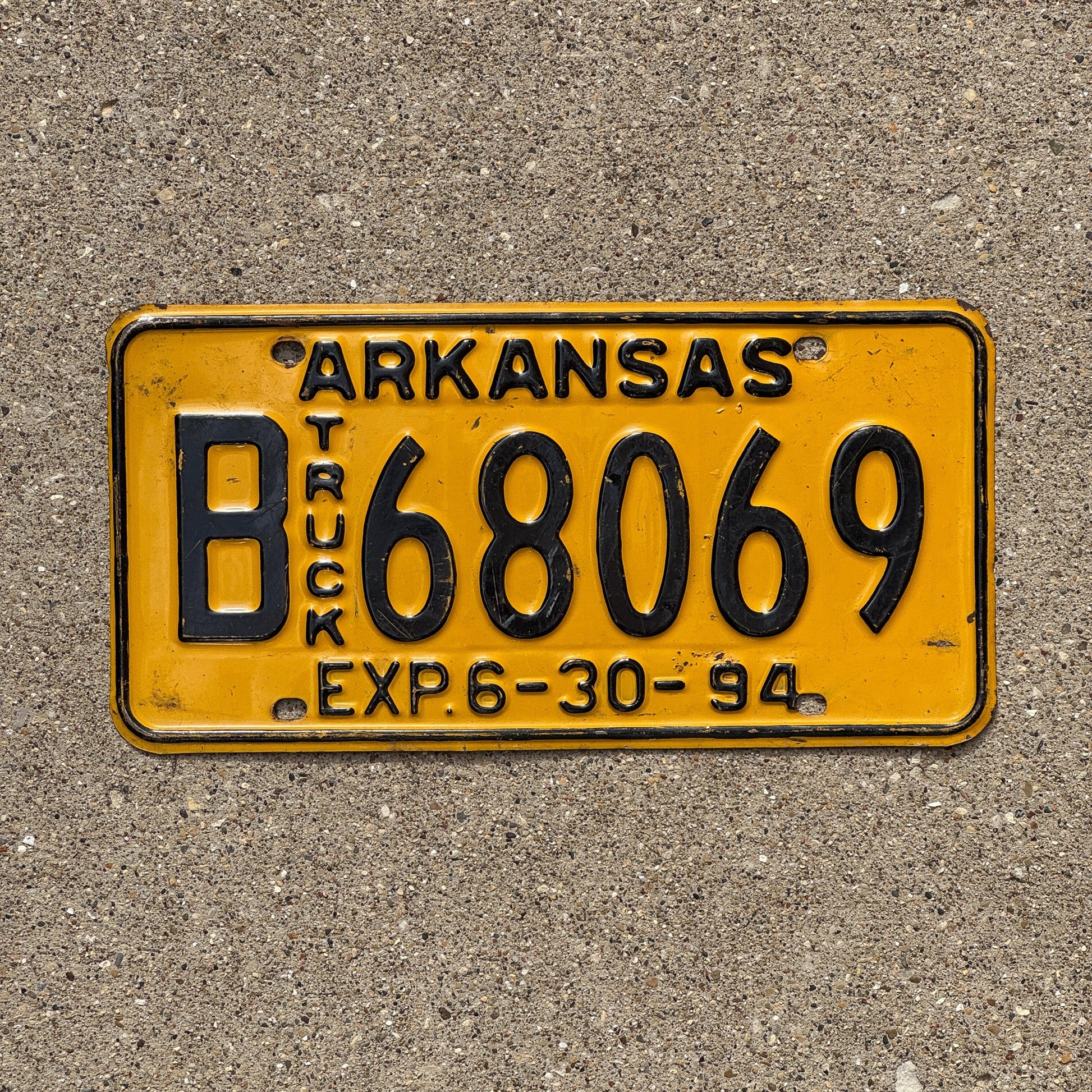 Photo of a 1994 Arkansas TRUCK License Plate Auto Tag Garage Decor Vintage B 68069