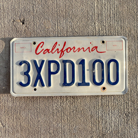 Photo of a 1994 California License Plate Auto Tag 2 Garage Decor 3 XPD 100