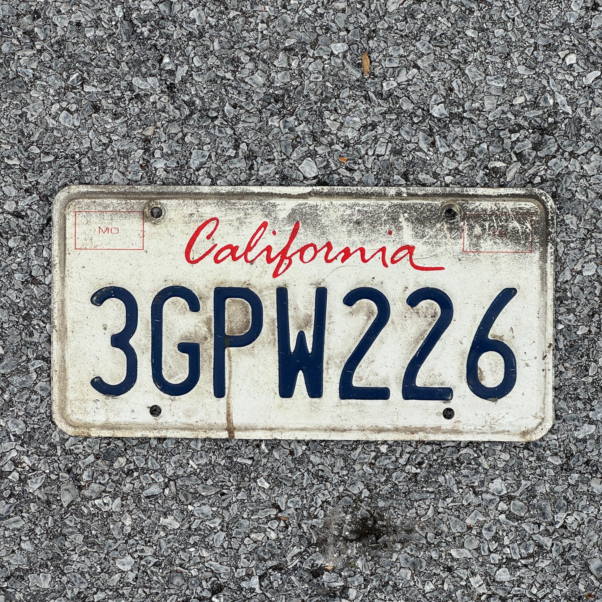 Photo of a 1994 California License Plate Auto Tag Garage Decor Vintage 3GPW226