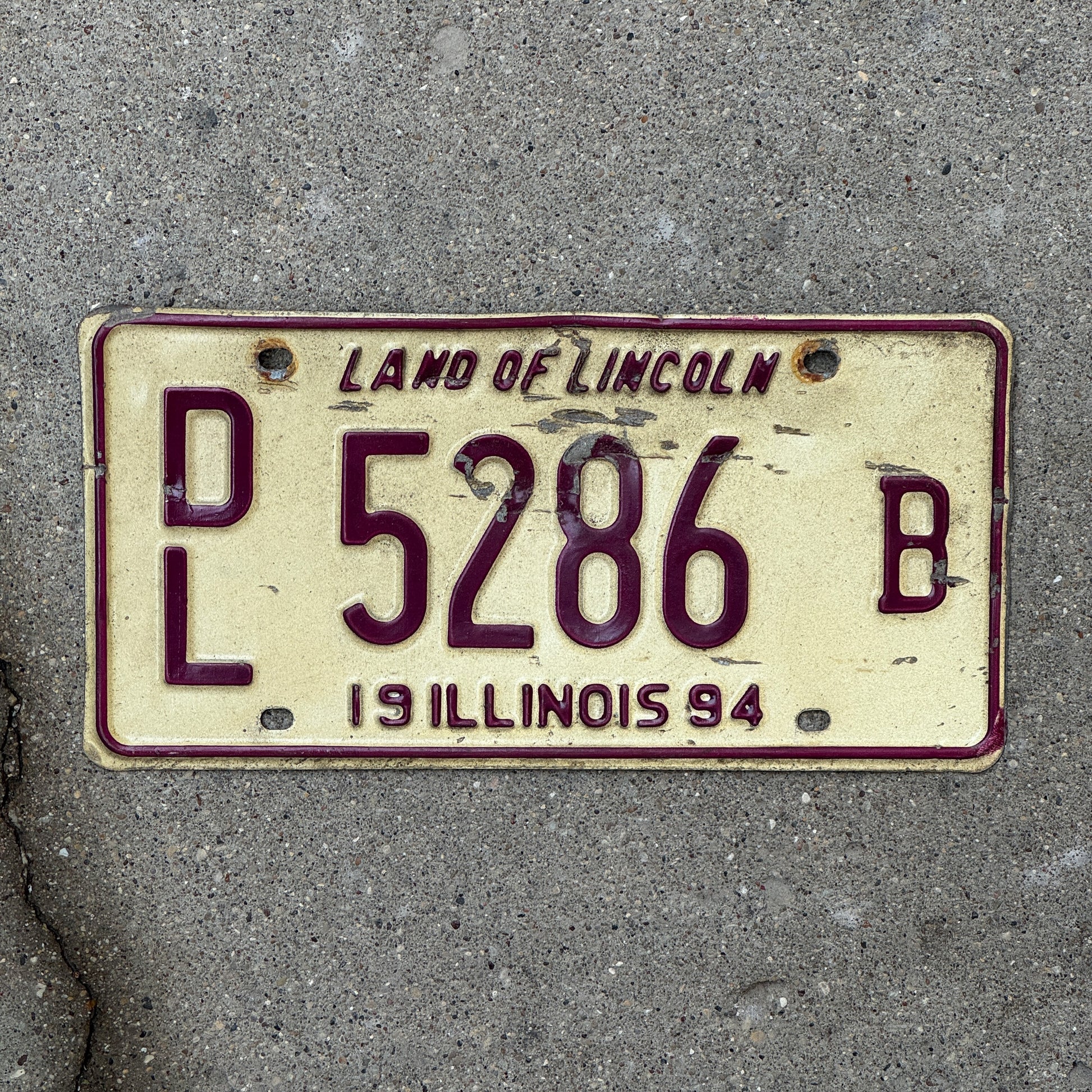 Photo of a 1994 Illinois Dealer License Plate Auto Tag 2 Vintage Garage 5286 B with original patina