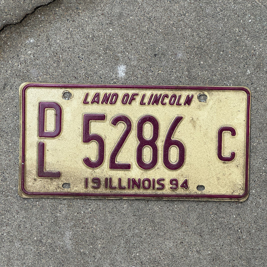 Photo of a 1994 Illinois Dealer License Plate Auto Tag Garage Decor Vintage 5286 C with original patina