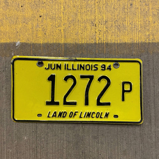 Photo of a 1994 Illinois Truck License Plate Auto Tag Garage Decor Vintage 1272 P with original patina