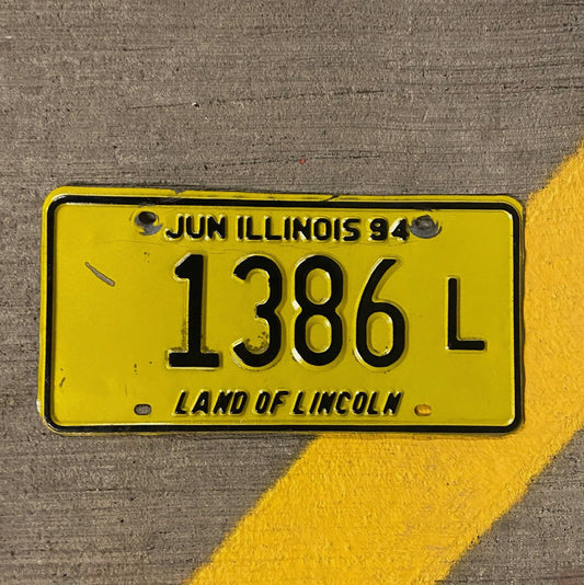 Photo of a 1994 Illinois Truck License Plate Auto Tag Garage Decor Vintage 1386 L with original patina