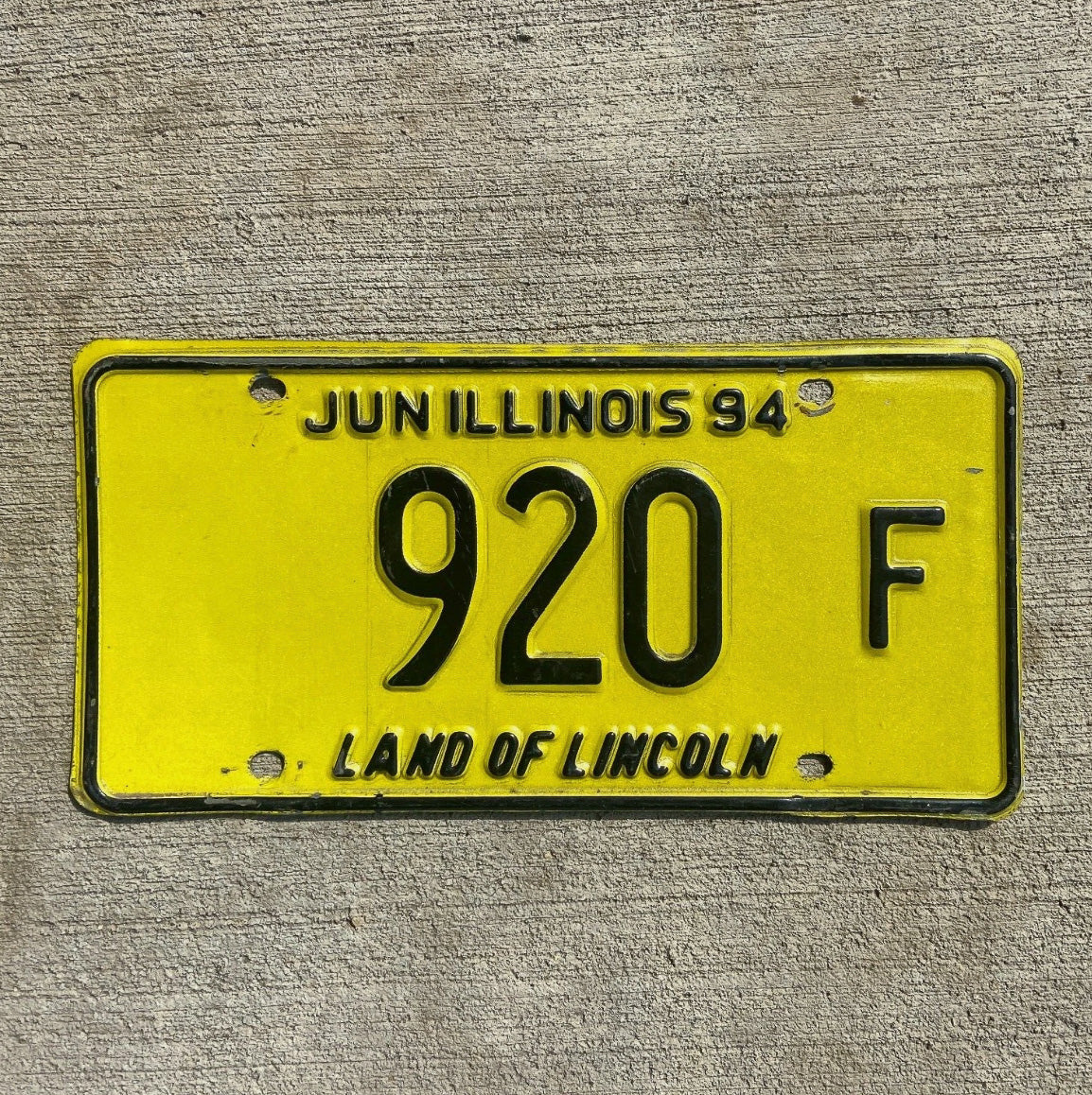 Photo of a 1994 Illinois Truck License Plate Auto Tag Garage Decor Vintage 920 F