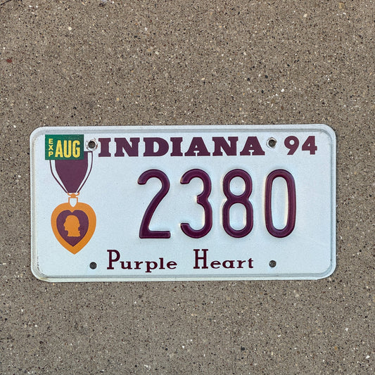 Photo of a 1994 Indiana Military License Plate Auto Tag Garage Decor Vintage Purple Heart 2380 with original patina