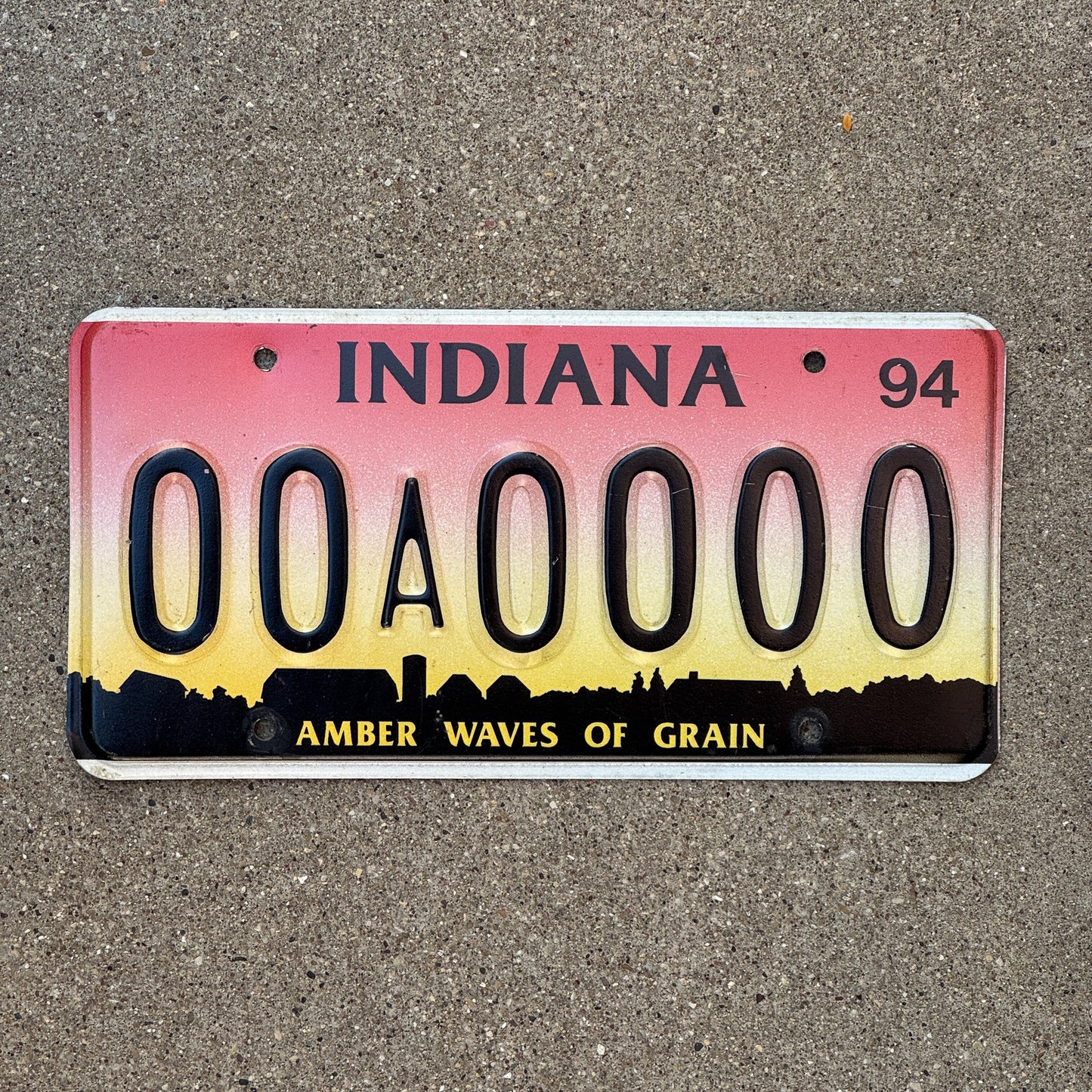 Photo of a 1994 Indiana Sample License Plate Auto Tag 2 Garage Decor 00A0000 with original patina