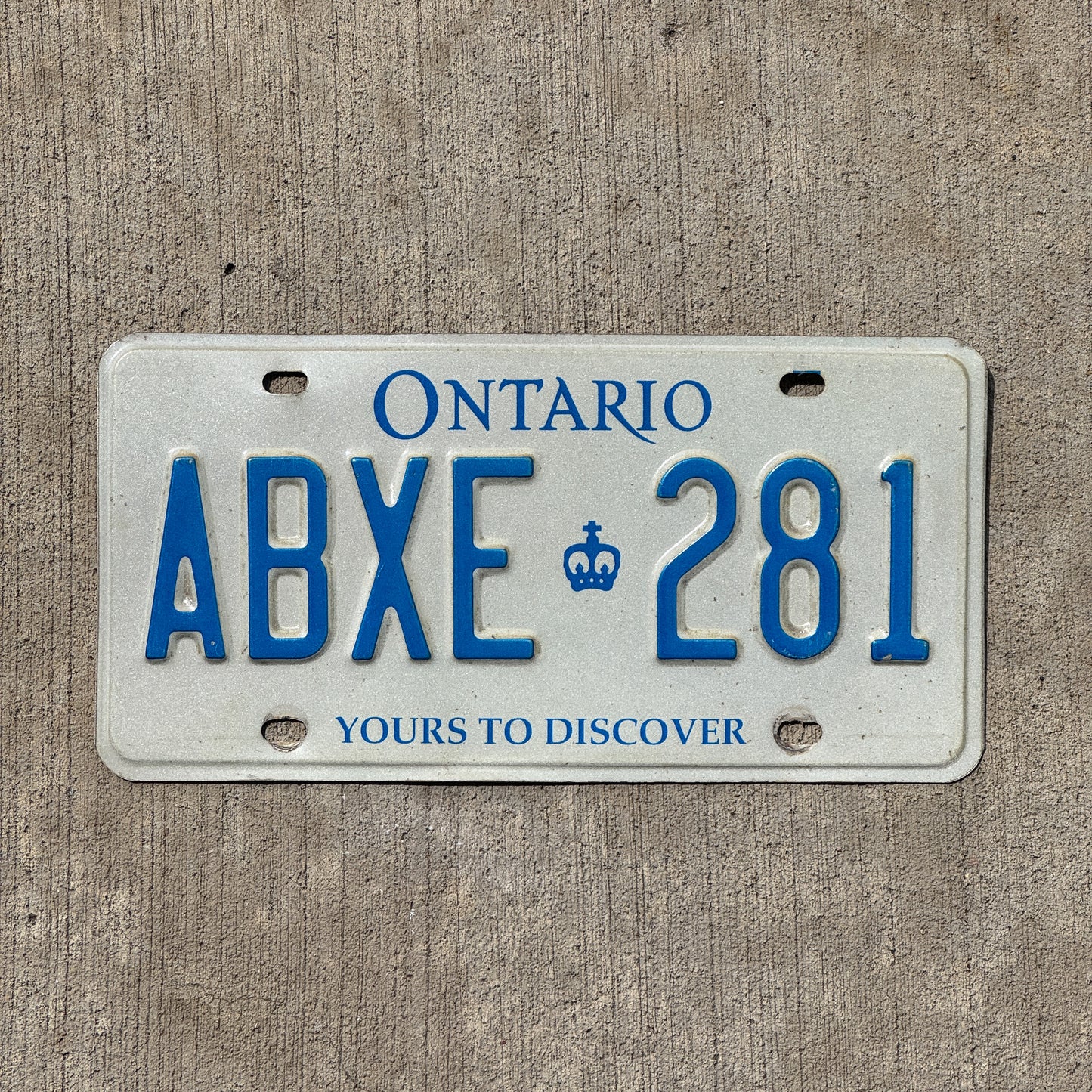 Photo of a 1994 Ontario License Plate Auto Tag Garage Decor Vintage ABXE 281 with original patina