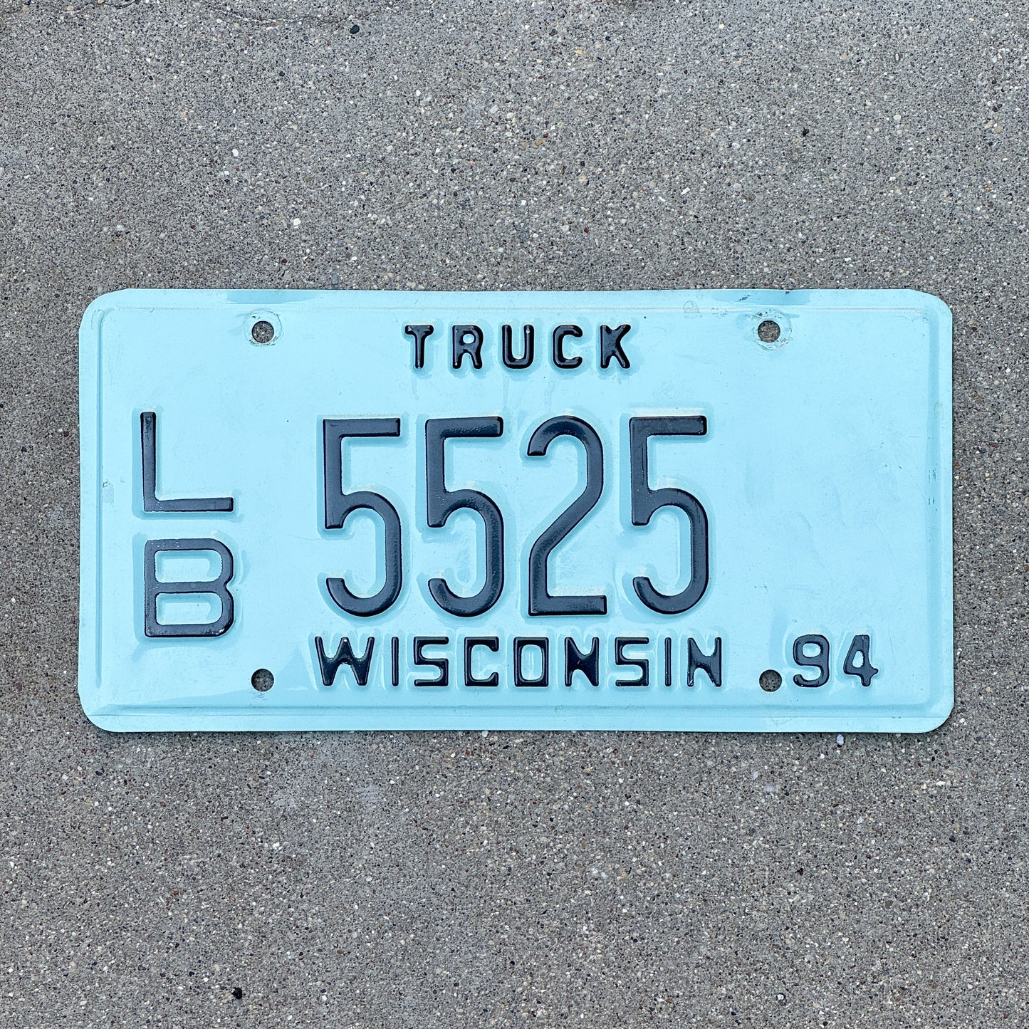 Photo of a 1994 Wisconsin Truck License Plate Auto Tag Garage Decor Vintage LB 5525 with original patina
