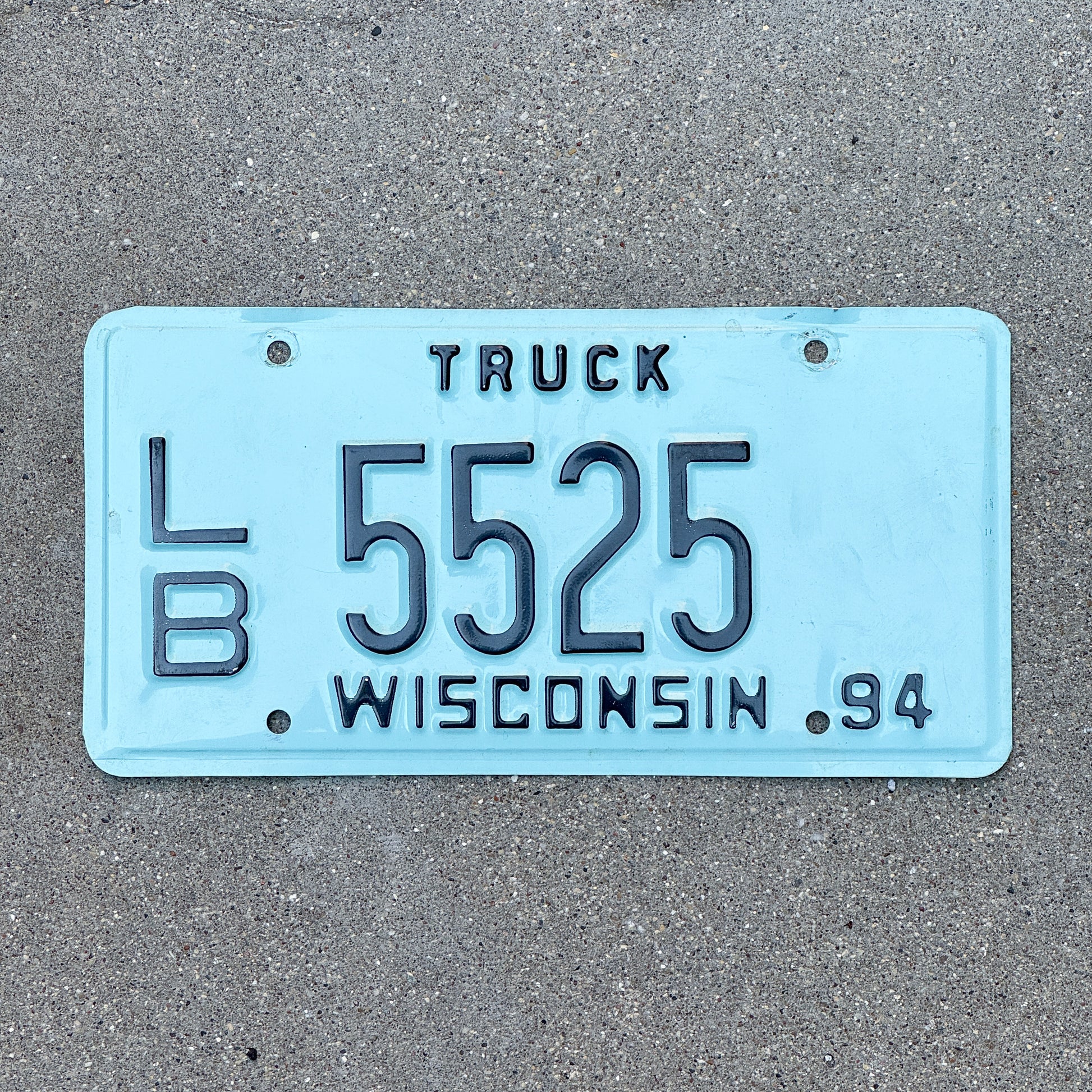 Photo of a 1994 Wisconsin Truck License Plate Auto Tag Garage Decor Vintage LB 5525 with original patina