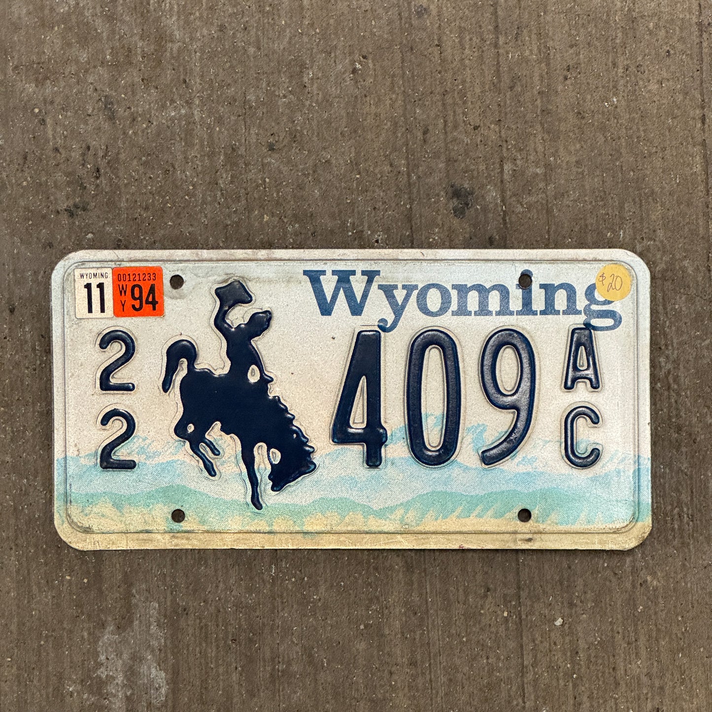 Photo of a 1994 Wyoming License Plate Auto Tag Garage Decor Vintage 22 409 AC with original patina