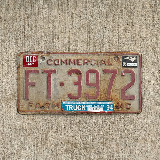 Photo of a 1995 1996 North Carolina Farm Truck License Plate Auto Tag Garage Decor Vintage FT 3972 with original patina