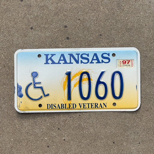Photo of a 1995 1997 Kansas Disabled Veteran License Plate Auto Tag Garage Decor Vintage Military 1060
