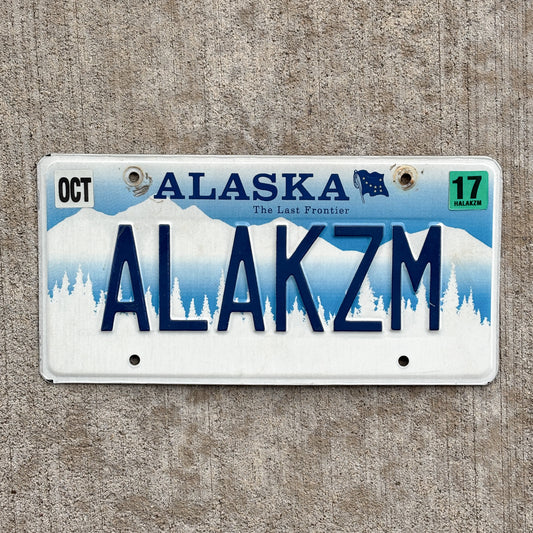 Photo of a 1995 2017 Alaska Vanity License Plate Auto Tag Garage Decor Vintage Alakazam Magic Spell Incantation ALAKZM with original patina