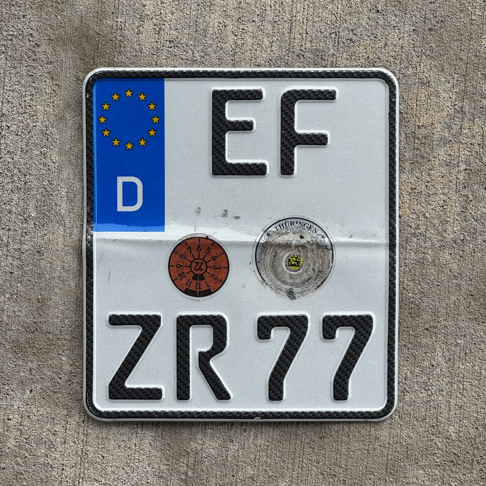 Photo of a 1995 Germany Motorcycle License Plate Auto Tag Garage Decor Vintage Erfurt Thuringia EF ZR 77 with original patina