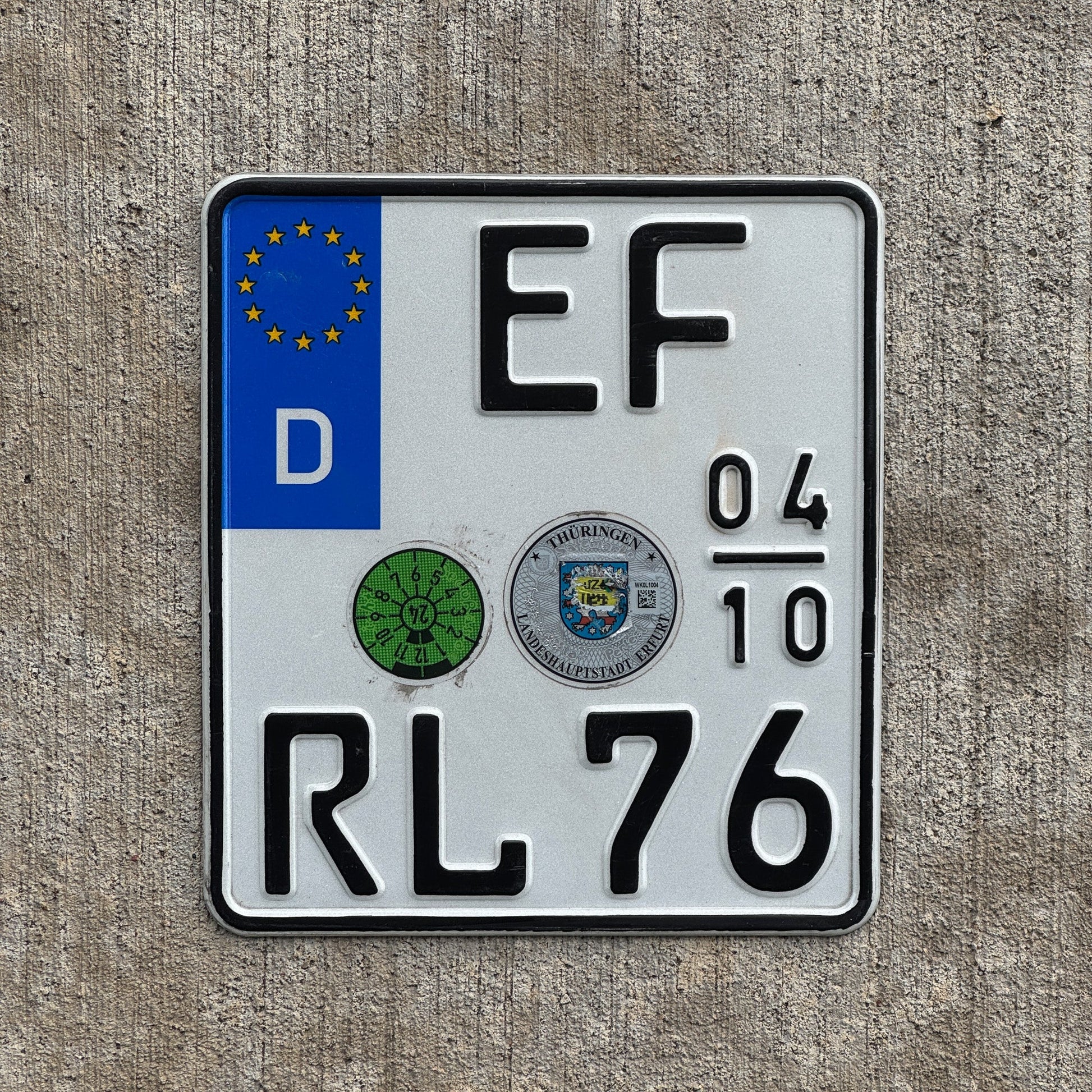 Photo of a 1995 Germany Seasonal Motorcycle License Plate Auto Tag Garage Decor Vintage Thuringia EF RL 76 with original patina