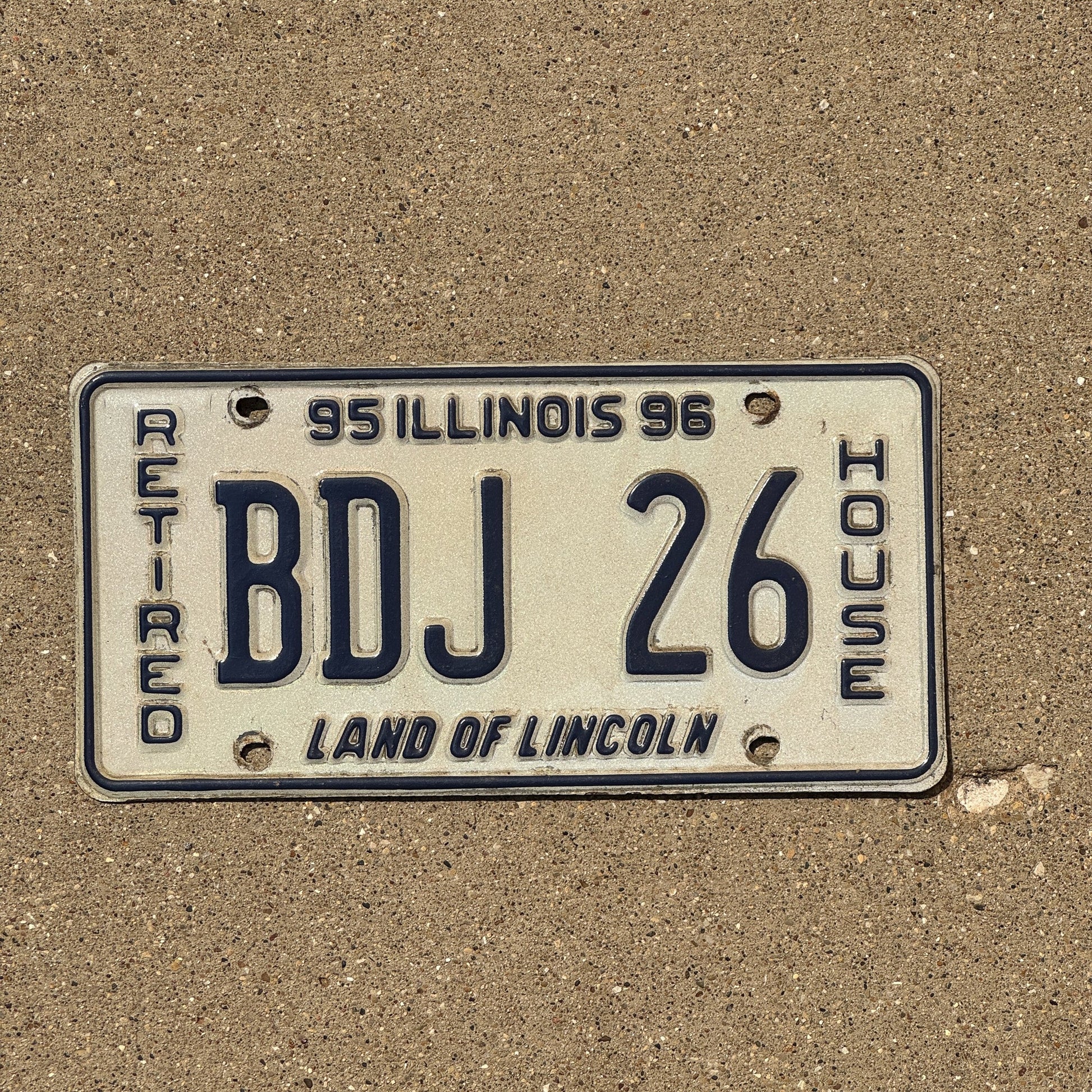 Photo of a 1995 Illinois Retired House Member License Plate Auto Tag Garage Decor Vintage BDJ 26