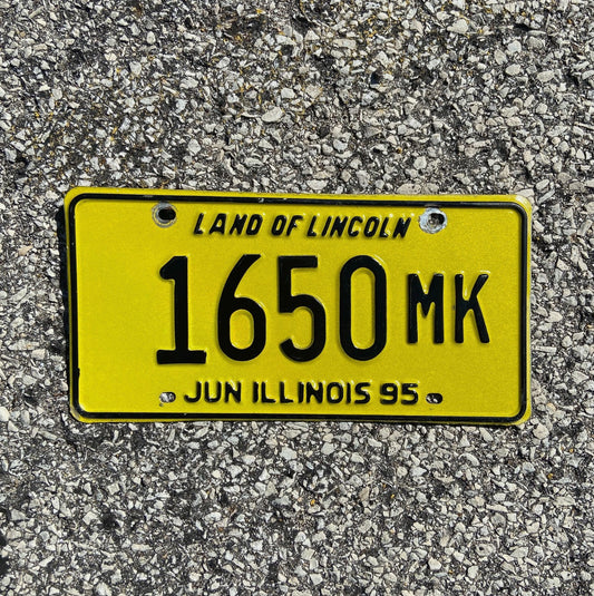Photo of a 1995 Illinois Truck Mileage Tax License Plate Auto Tag 2 Garage Decor Low Number 1950 MK