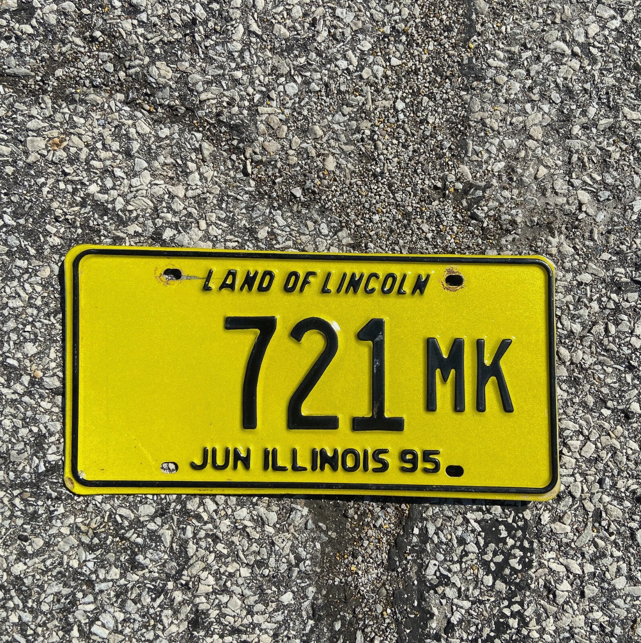 Photo of a 1995 Illinois Truck Mileage Tax License Plate Auto Tag Garage Decor Vintage Low Number 721 MK