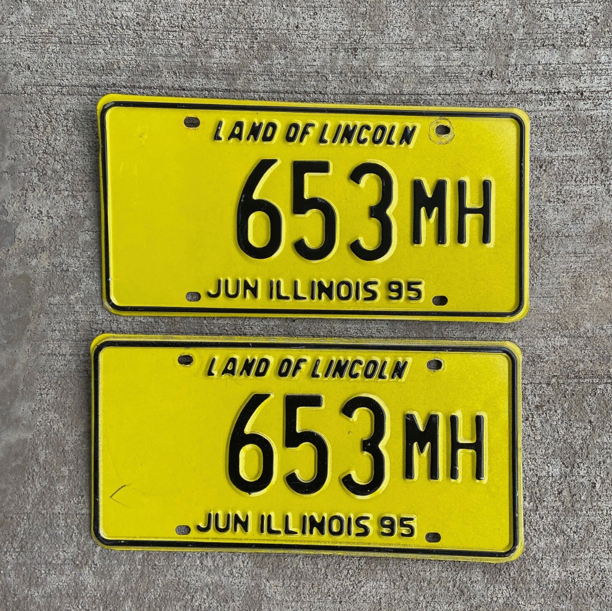 Photo of a 1995 Illinois Truck Mileage Tax License Plate Pair Auto Tag Garage Decor Vintage 653 MH with original patina