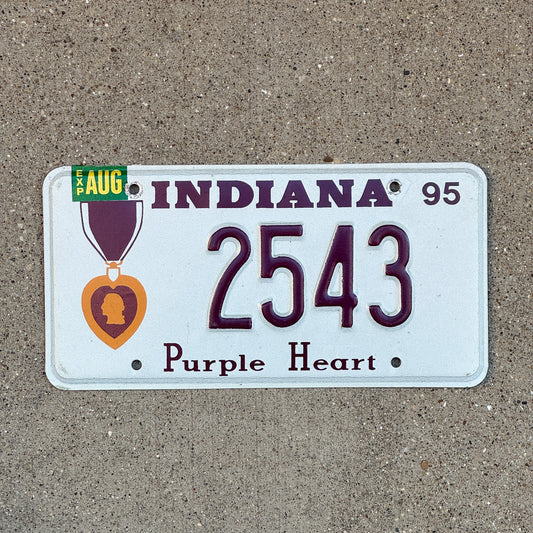Photo of a 1995 Indiana Military License Plate Auto Tag Garage Decor Vintage Purple Heart 2543 with original patina