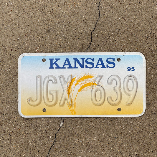 Photo of a 1995 Kansas Error License Plate Auto Tag Garage Decor Vintage JGX 639