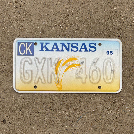 Photo of a 1995 Kansas Error License Plate Auto Tag Garage Decor Vintage Misprint GXK 460