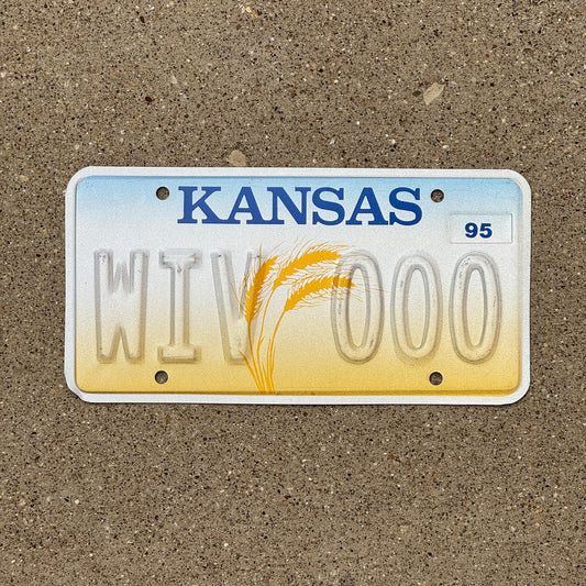 Photo of a 1995 Kansas Error License Plate Auto Tag Garage Decor Vintage Repeat Repeating Misprint WIV 000