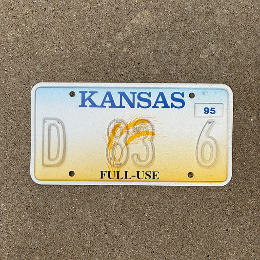 Photo of a 1995 Kansas Full Use Error License Plate Auto Tag Garage Decor Vintage Misprint D 83 6