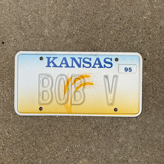 Photo of a 1995 Kansas Vanity Error License Plate Auto Tag Garage Decor Vintage Misprint BOB V