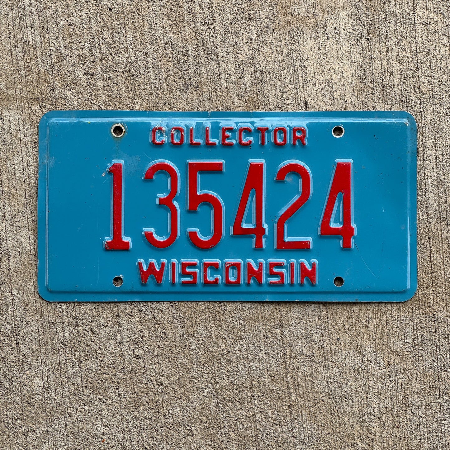 Photo of a 1995 Wisconsin Collector License Plate Auto Tag Garage Decor Vintage 135424 with original patina
