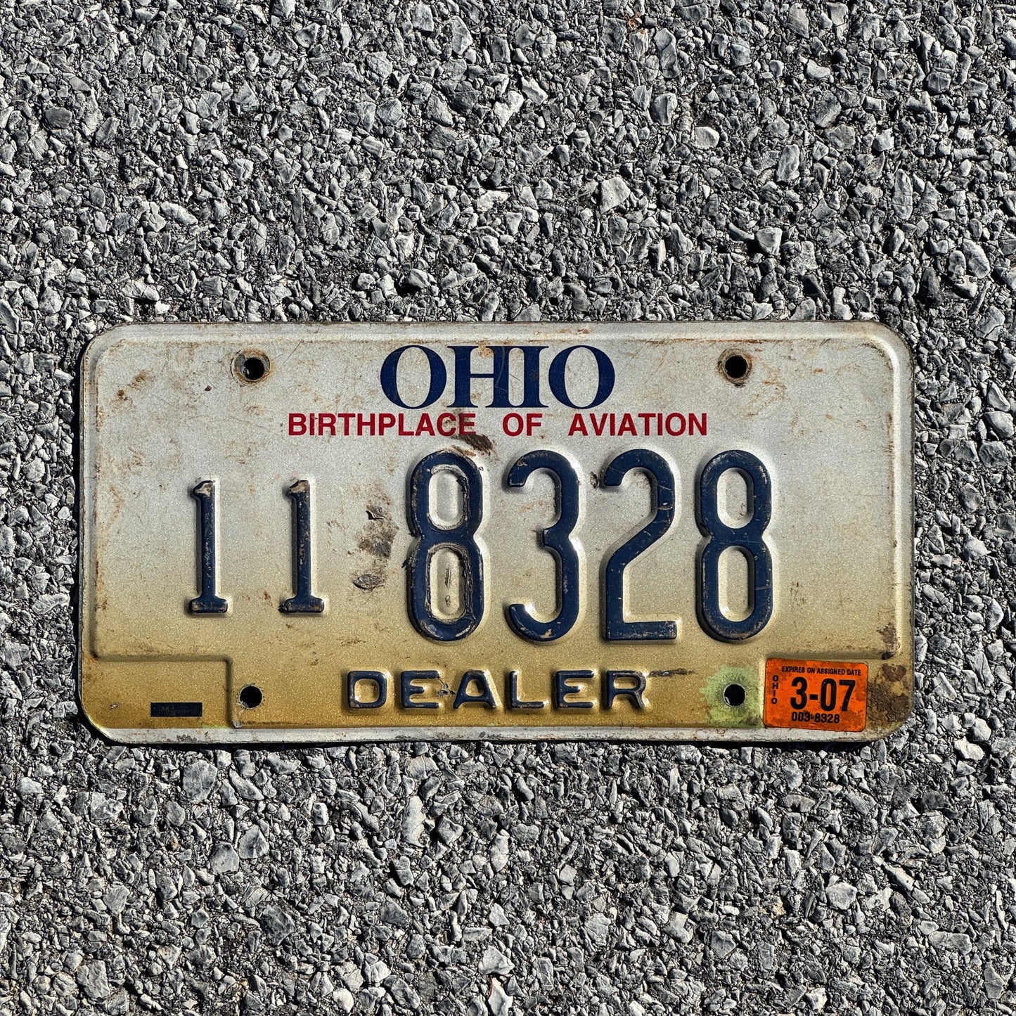 Photo of a 1996 2007 Ohio Dealer License Plate Auto Tag Garage Decor Vintage 11 8328
