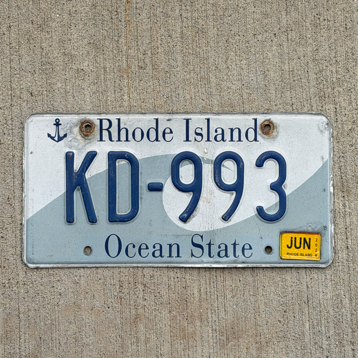 Photo of a 1996 2023 Rhode Island License Plate Auto Tag Garage Decor Vintage Wave KD 993 with original patina