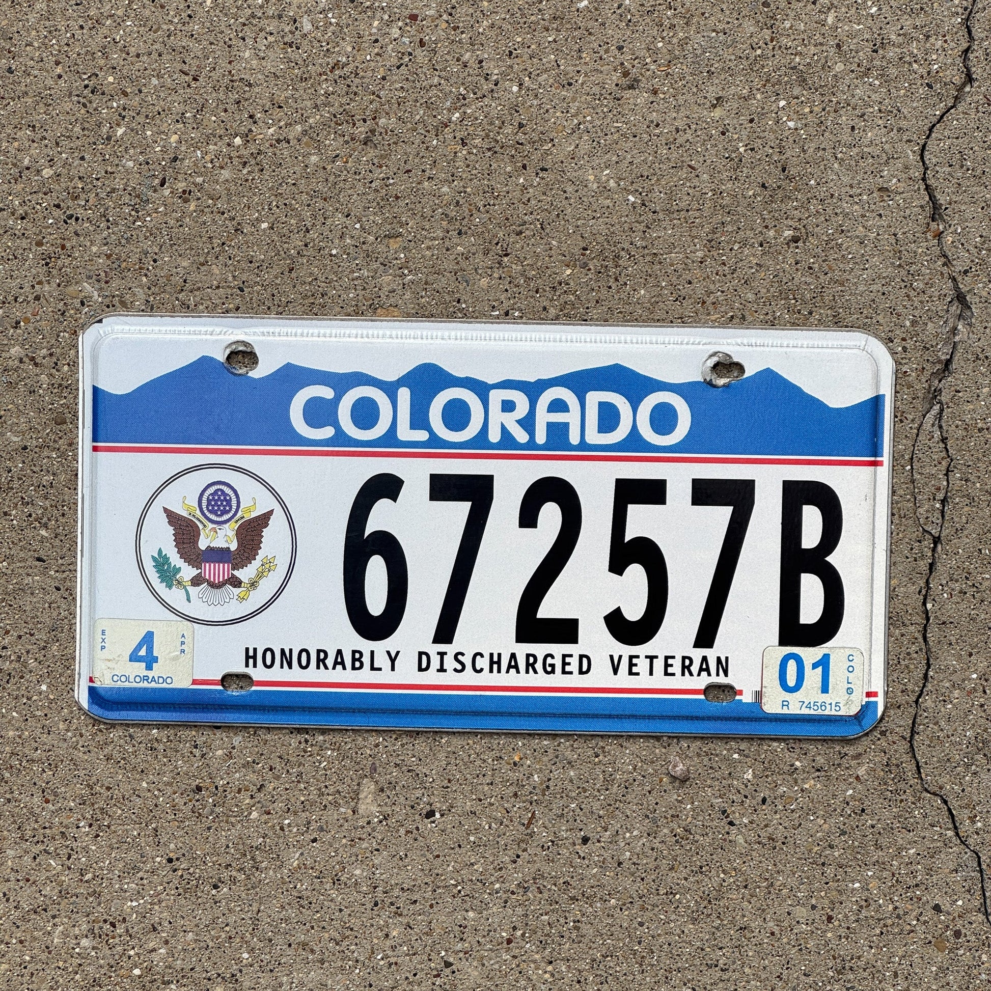 Photo of a 1996 Colorado Military License Plate Auto Tag Garage Decor Vintage Honorably Discharged Veteran 67257 B