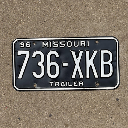 Photo of a 1996 Missouri Trailer License Plate Auto Tag Garage Decor Vintage 736 XKB