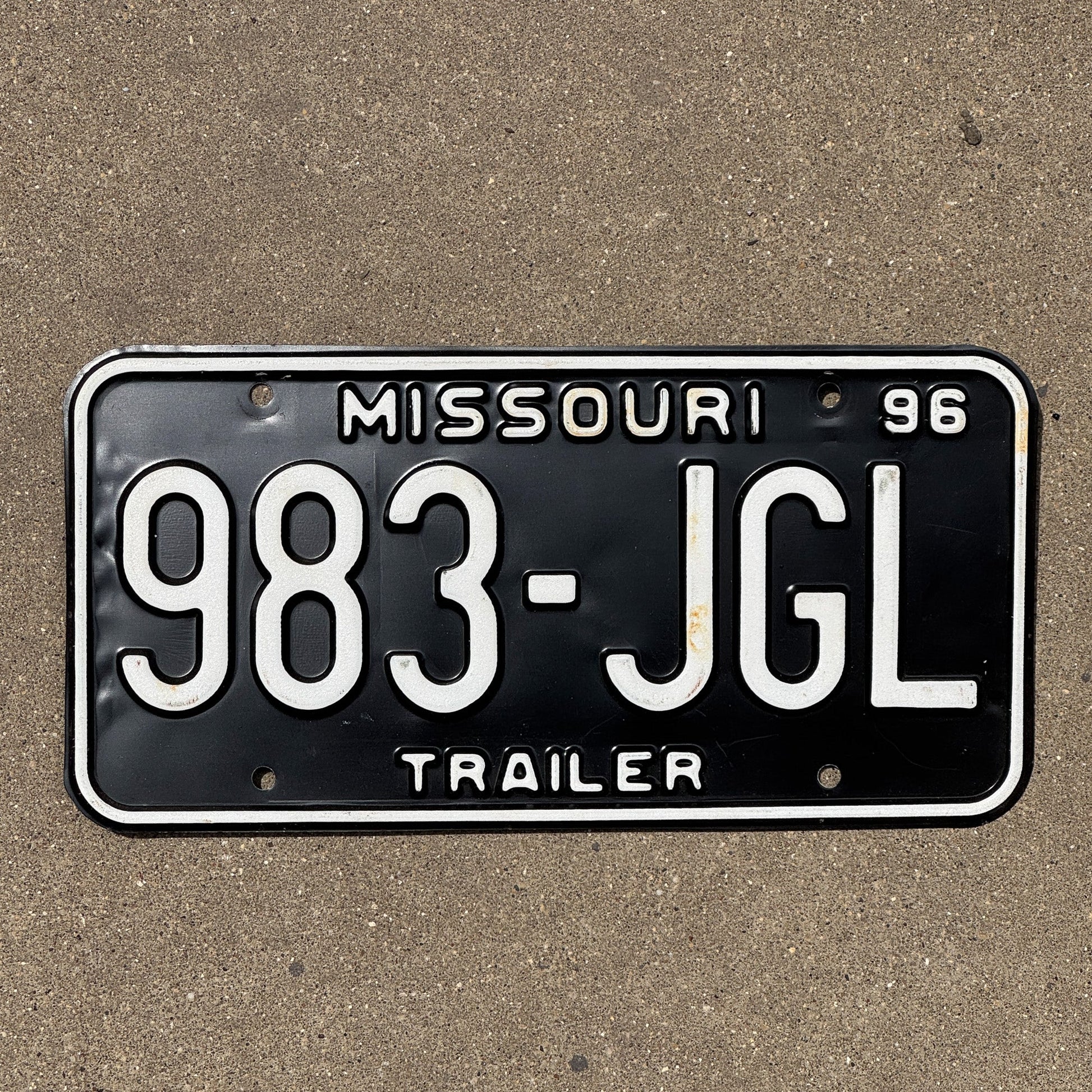 Photo of a 1996 Missouri Trailer License Plate Auto Tag Garage Decor Vintage 983 JGL