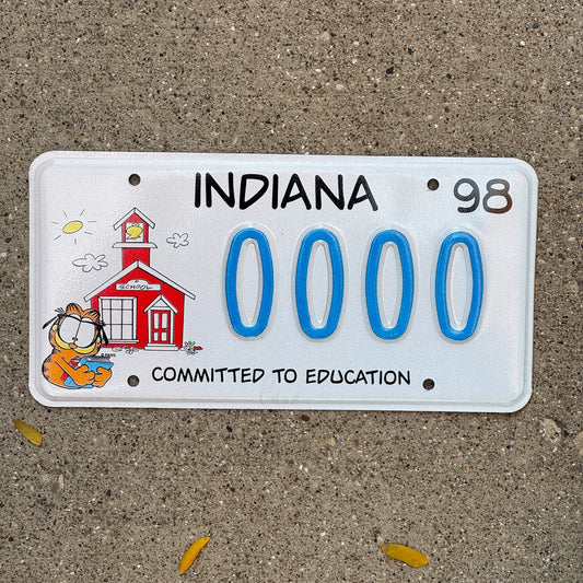 Photo of a 1997 1998 Indiana Graphic Sample License Plate Auto Tag Garage Decor Vintage Education 0000 with original patina
