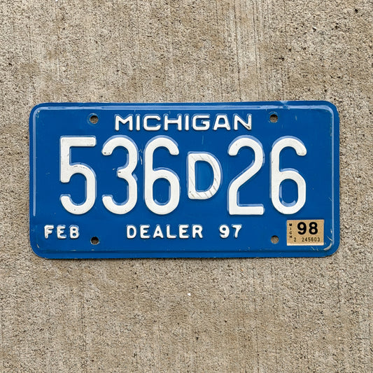 Photo of a 1997 1998 Michigan Dealer License Plate Auto Tag Garage Decor Vintage 536 D 26 with original patina