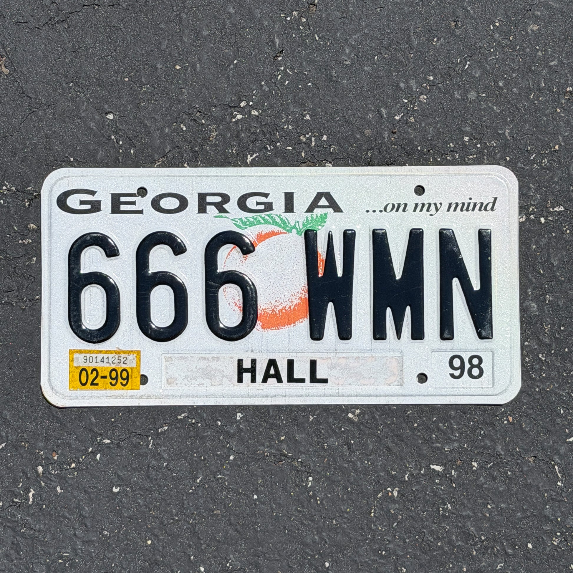 Photo of a 1997 1999 Georgia License Plate Auto Tag Garage Decor Vintage 666 Devil Evil Repeat Repeating 666 WMN with original patina