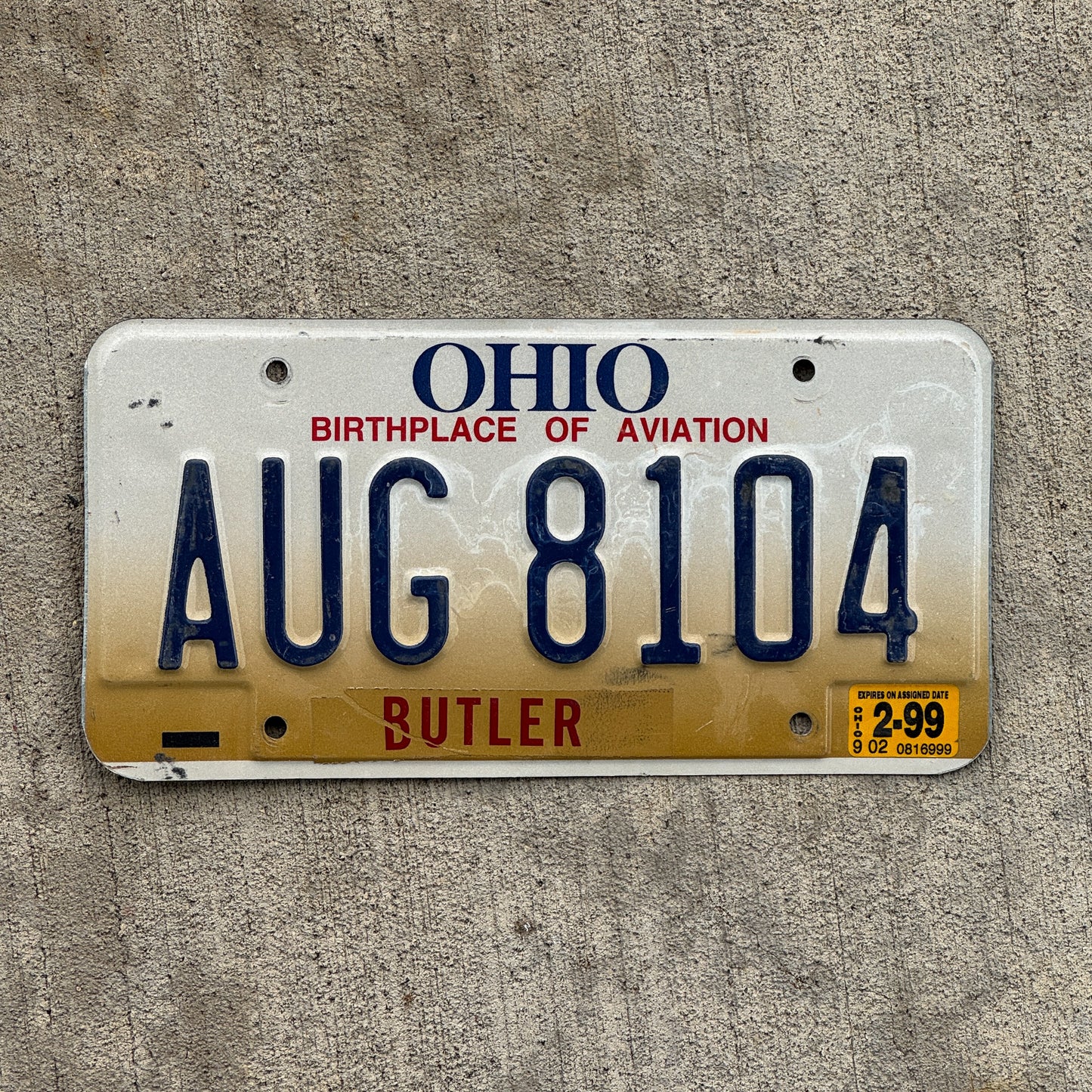 Photo of a 1997 1999 Ohio License Plate Auto Tag Garage Decor Vintage AUG 8104 with original patina