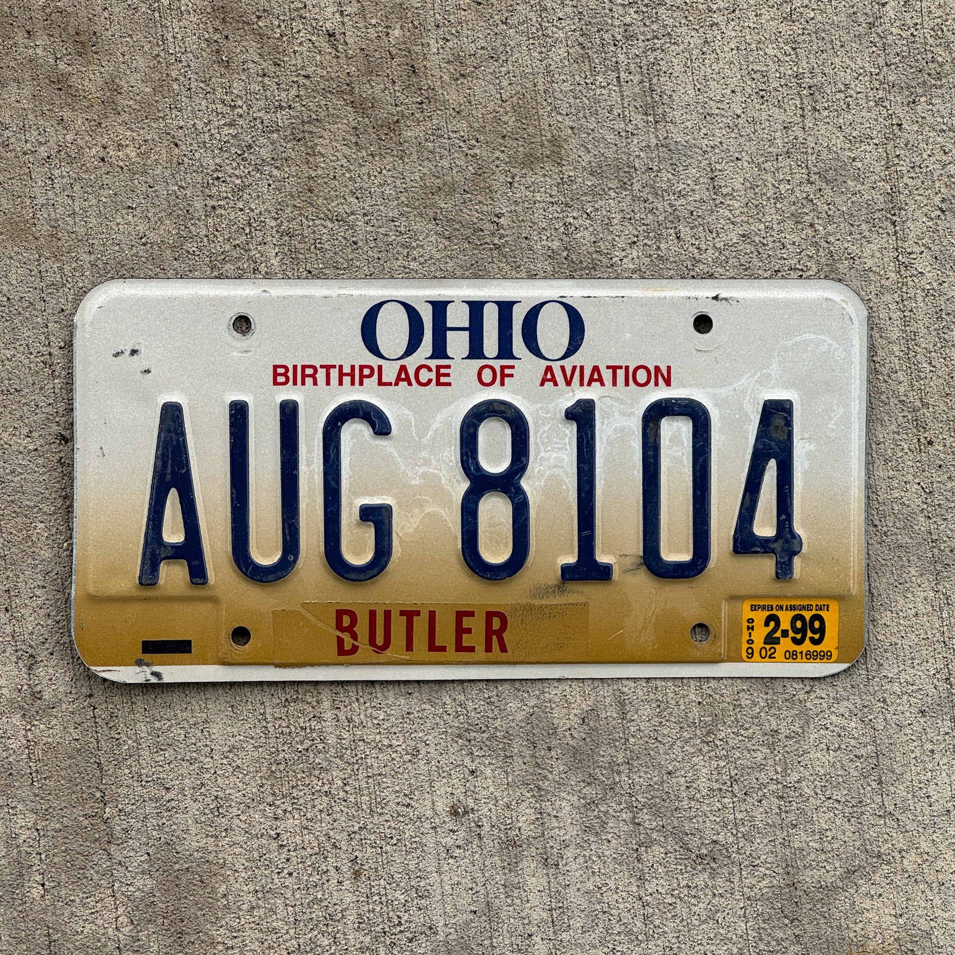 Photo of a 1997 1999 Ohio License Plate Auto Tag Garage Decor Vintage AUG 8104 with original patina