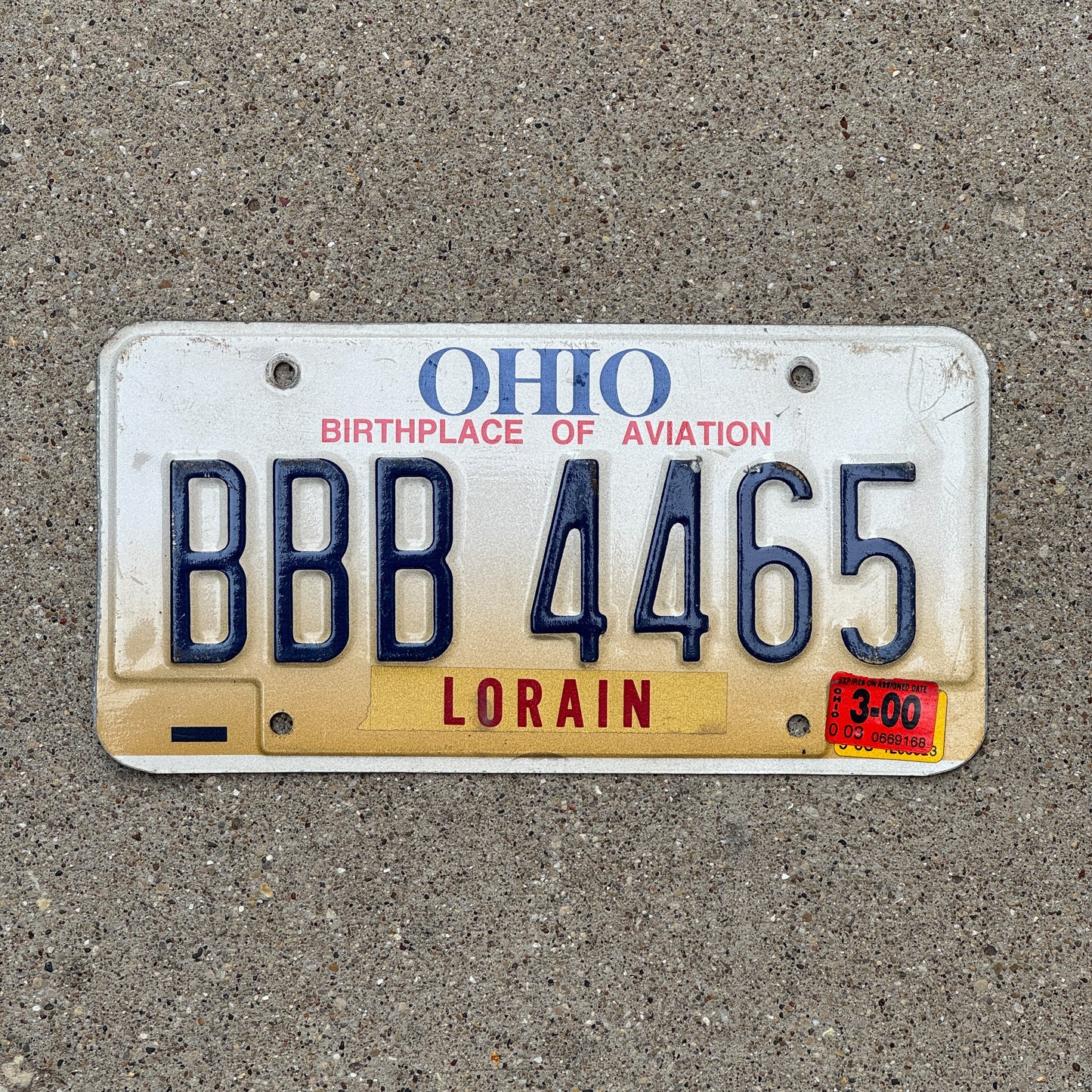 Photo of a 1997 2000 Ohio License Plate Auto Tag 1 Vintage Garage Repeat Repeating BBB 4465 with original patina