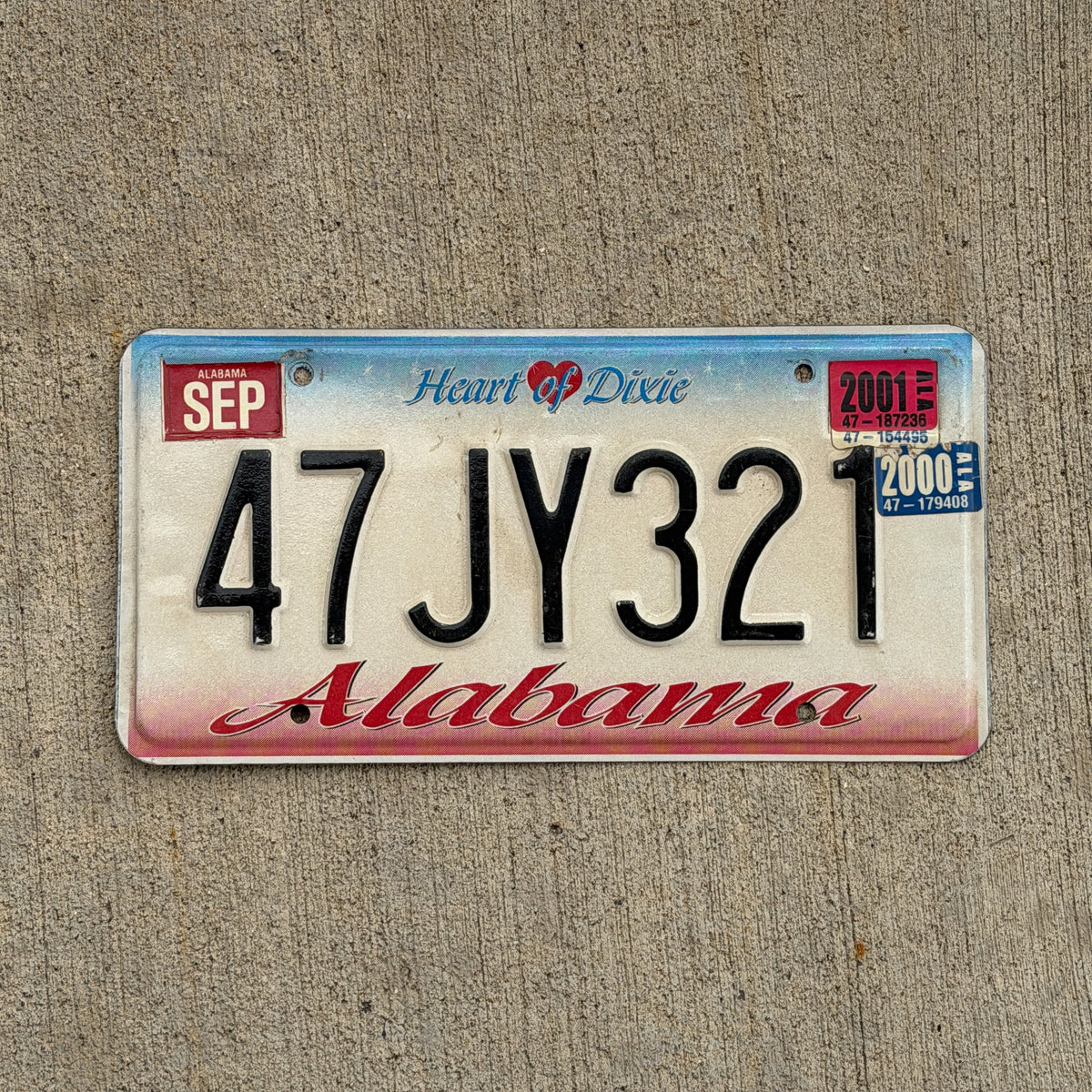 Photo of a 1997 2001 Alabama License Plate Auto Tag Garage Decor Vintage 47 JY 321 with original patina