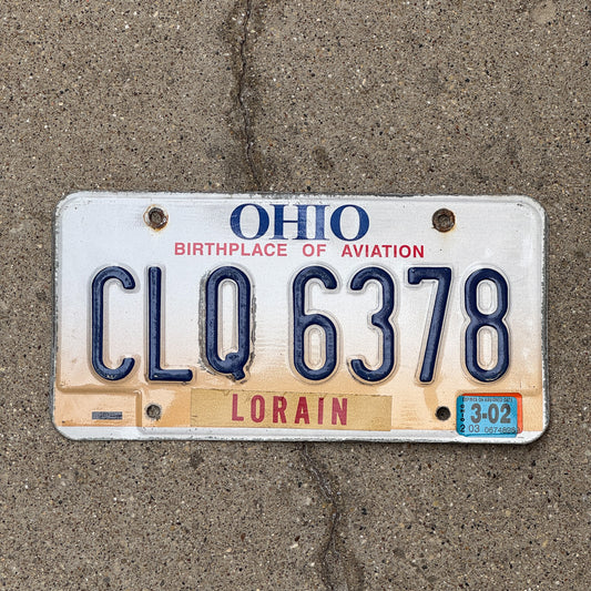 Photo of a 1997 2002 Ohio License Plate Auto Tag 2 Vintage Garage CLQ 6378 with original patina