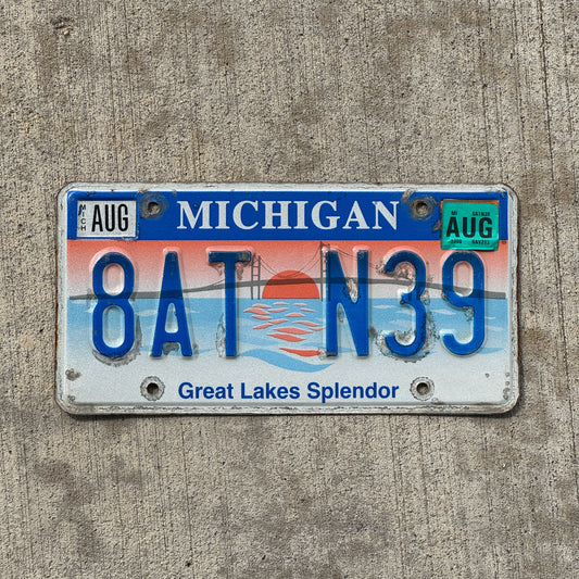 Photo of a 1997 2008 Michigan Graphic / Specialty License Plate Auto Tag Garage Decor Vintage Great Lakes Splendor 8 AT N39 with original patina