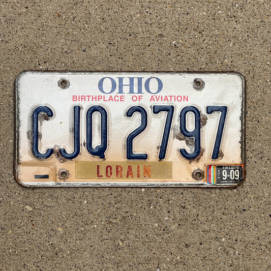 Photo of a 1997 2009 Ohio License Plate Auto Tag 1 Vintage Garage CJQ 2797 with original patina