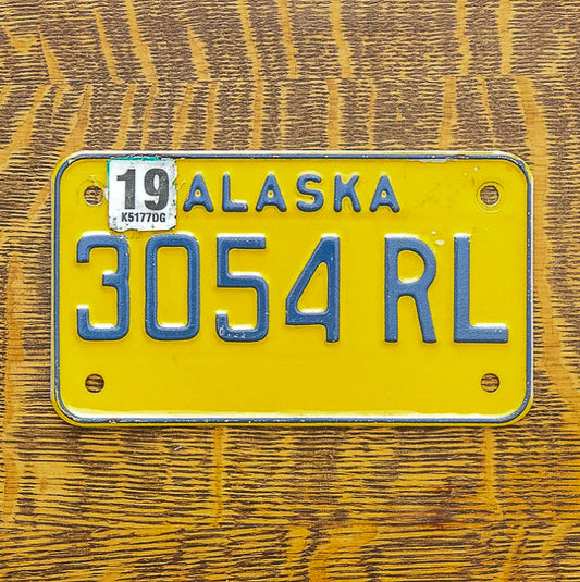 Photo of a 1997 2019 Alaska Motorcycle License Plate Auto Tag Garage Decor Vintage 3054 RL with original patina