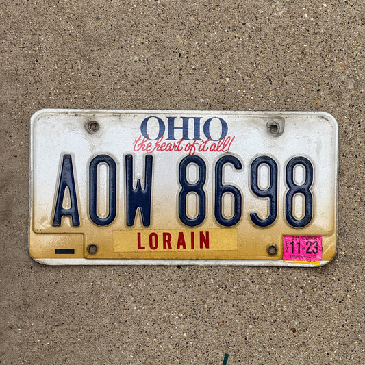 Photo of a 1997 2023 Ohio License Plate Auto Tag Garage Decor Vintage AOW 8698 with original patina