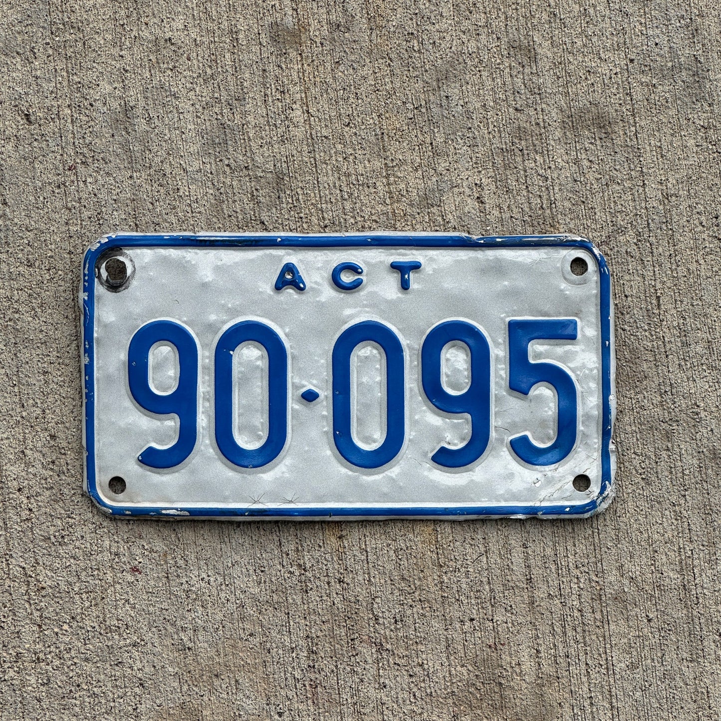 Photo of a 1997 Australian Capital Territory ACT Motorcycle License Plate Auto Tag Garage Decor Vintage Australia 90 095 with original patina